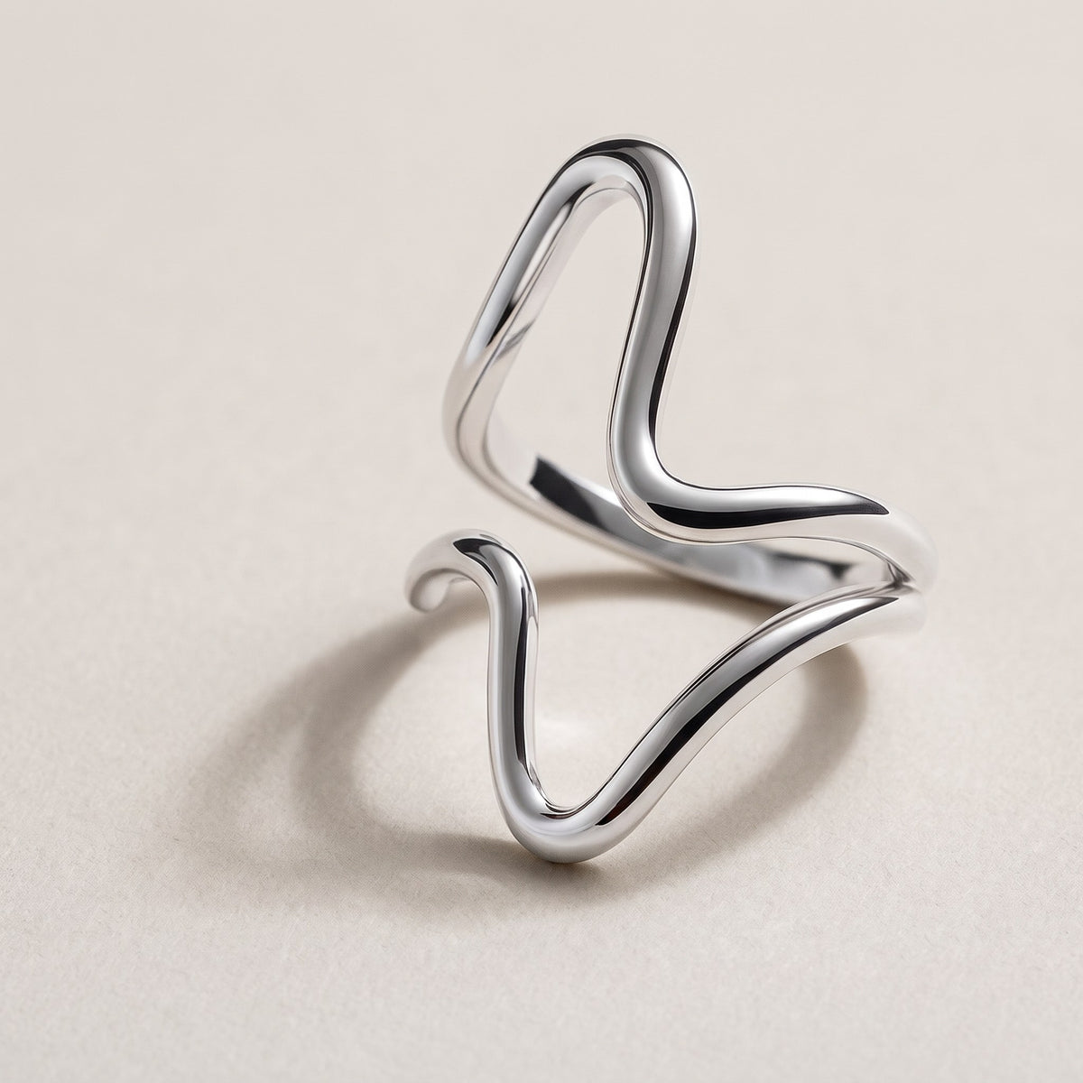 Isla Wave Ring in silver, an open sculptural wave ring