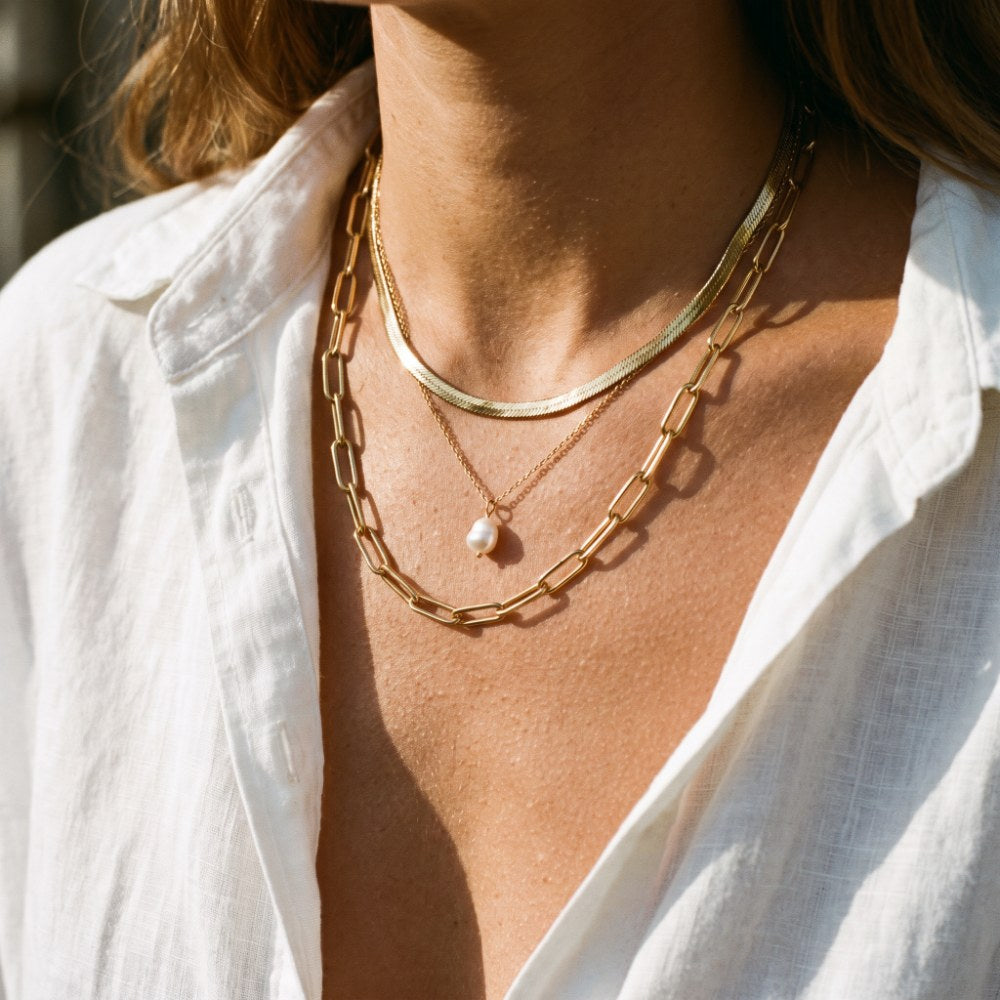 Layered gold necklaces