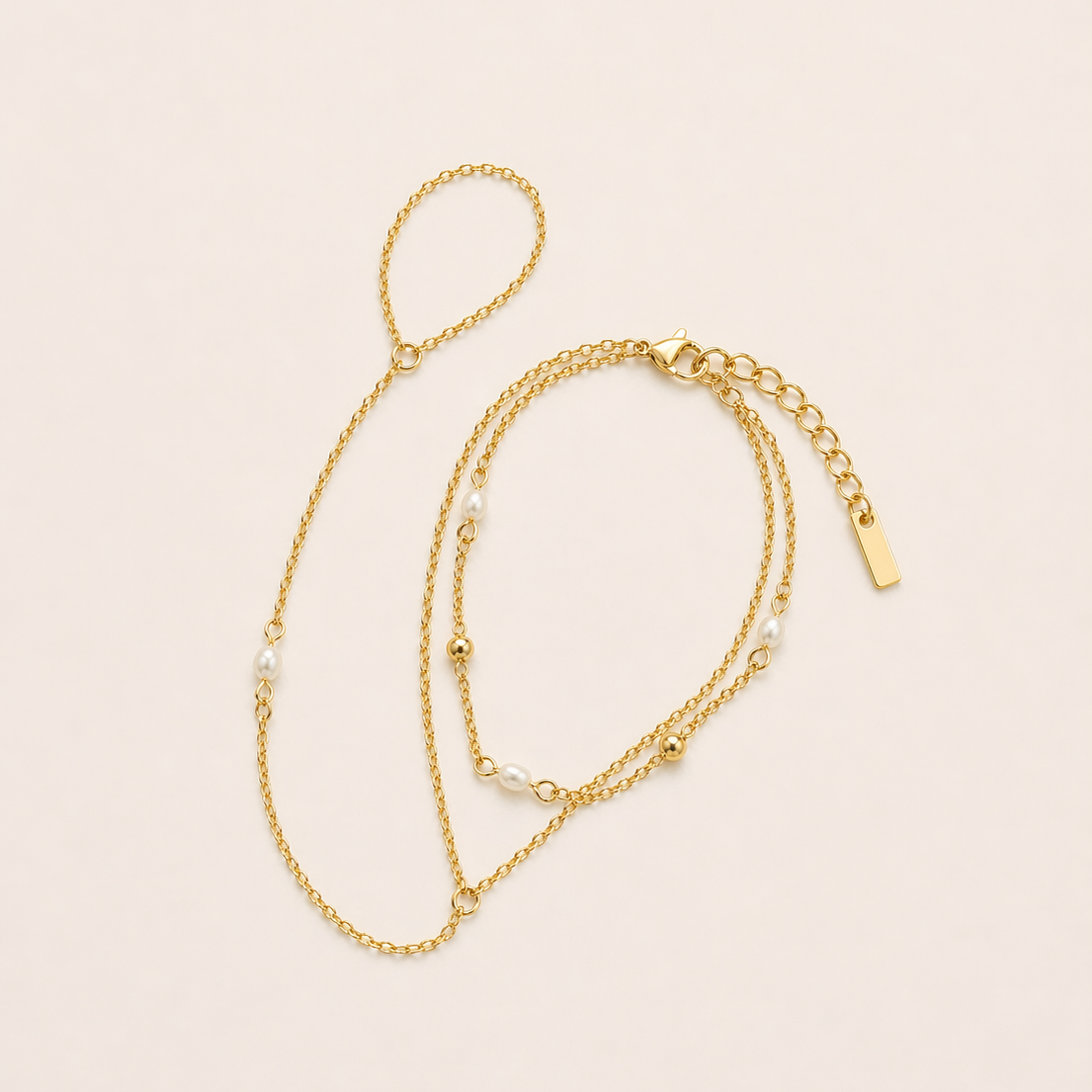 Pearl Whisper HandChain in gold