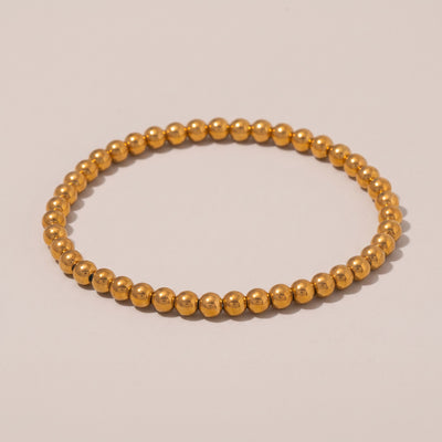 Caicos Beaded Bracelet in gold, polished round beads