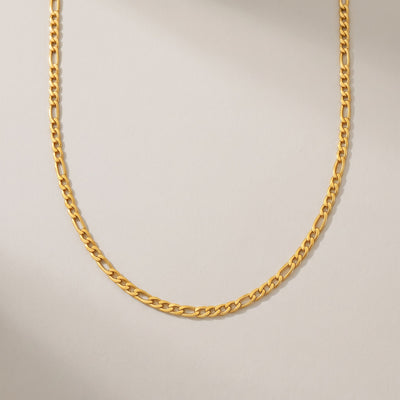 Positano Necklace in gold, a classic figaro chain