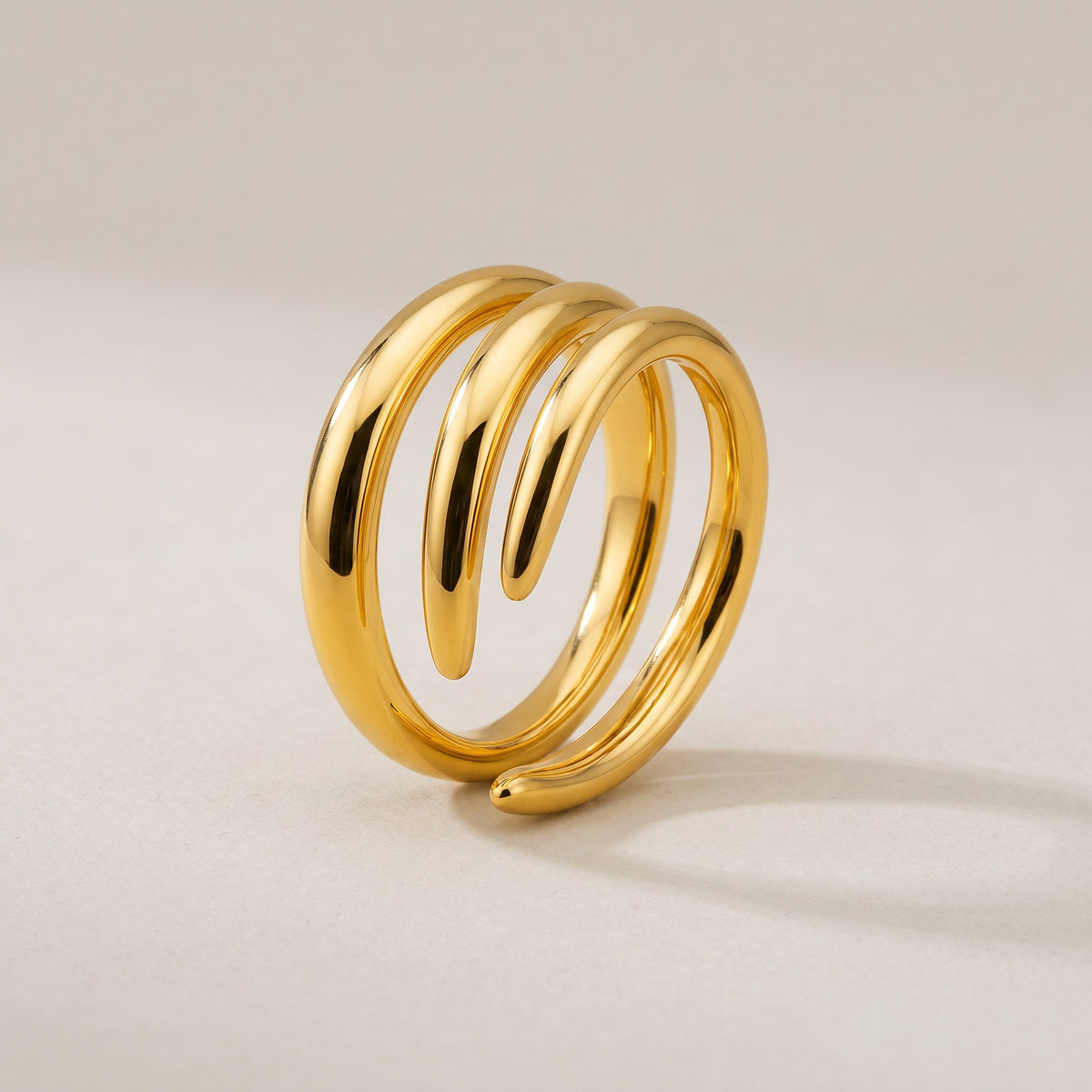 Reela Ring in gold, a chunky triple wrap ring